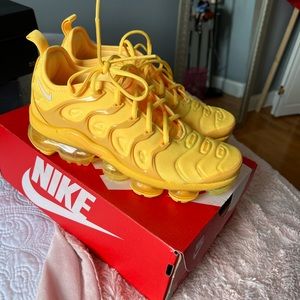 Yellow Vapormax shoes
